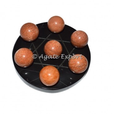 7 Peach Aventurine Ball on  Star of David Black Base