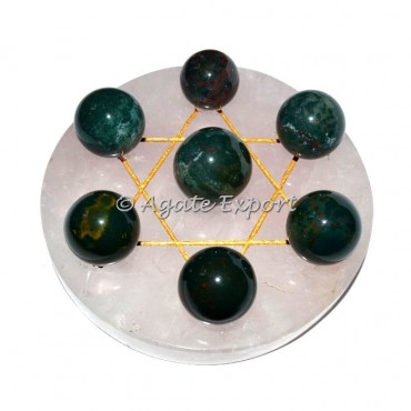 Seven Blood Stone Sphere on Gold Star of David Rose Quartz Base