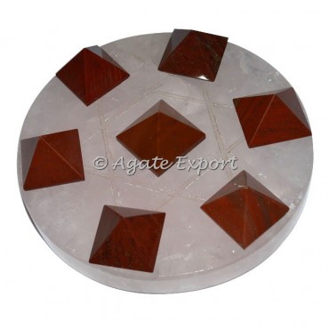 7 Red Jasper Pyramids on  Star David with Rose Base