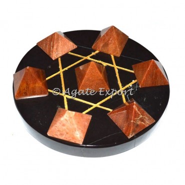 7 Peach Aventurine Pyramids on Gold Star David Black Base