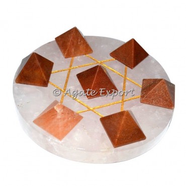 7 Peach Aventurine Pyramids on Gold Star David Rose Base