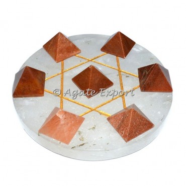 7 Peach Aventurine Pyramids on Gold Star David Crystal Base