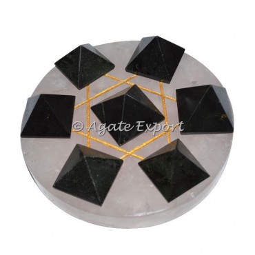 7 Black Toumaline Pyramids on Gold Star David Rose Base