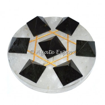 7 Black Toumaline Pyramids on Gold Star David Crystal Base