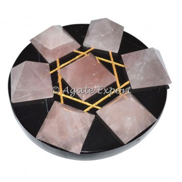 7 Rose Quartz Pyramids on Gold Star David Black Base